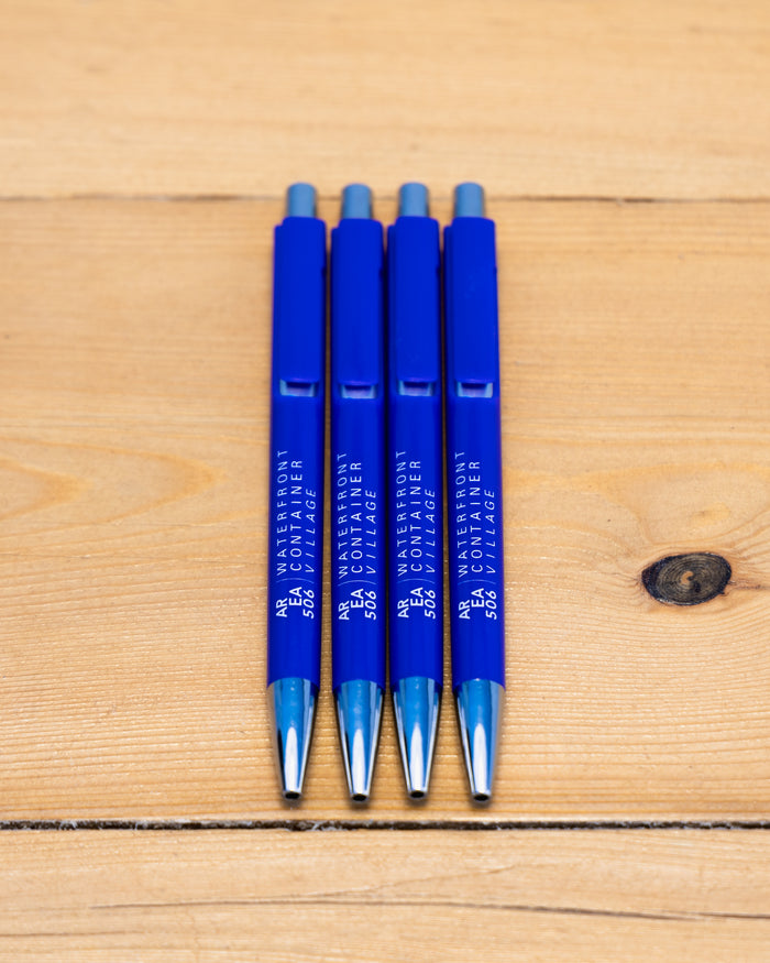 Blue AREA 506 Waterfront Container Village branded pen.