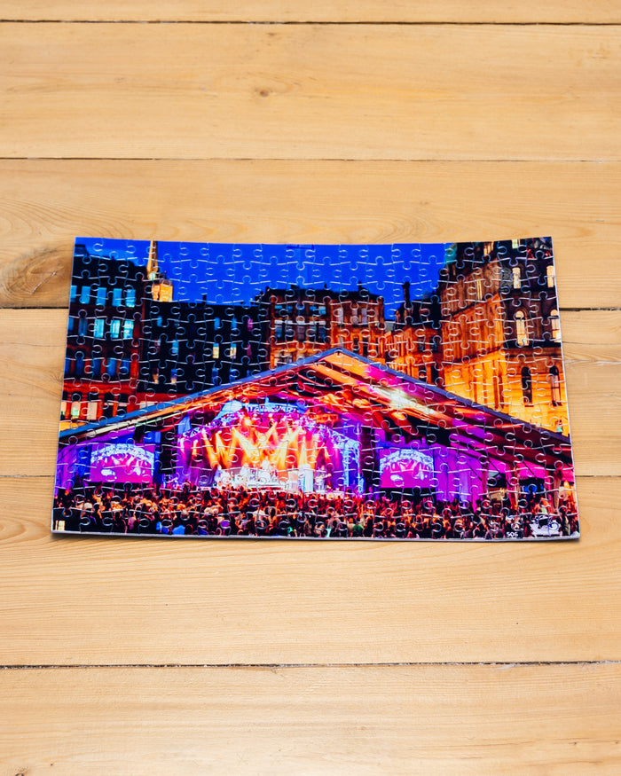 A small jigsaw puzzle created from a photo of AREA 506 Music Festival.